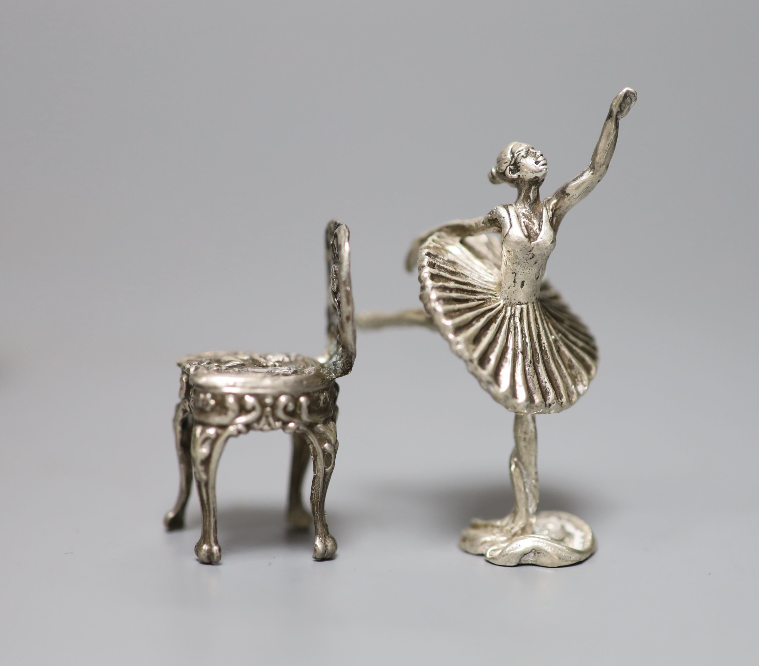 An Edwardian miniature silver model of a settee, two later chairs and a table and five other items, including aide memoire.